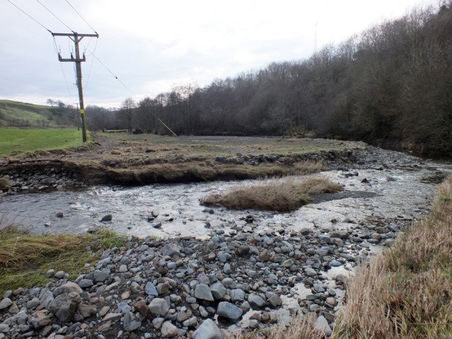 An area where a cattle grid had become blocked and erosion was underway. There was a braided channel on the inside of this bend that carried water in high flows.