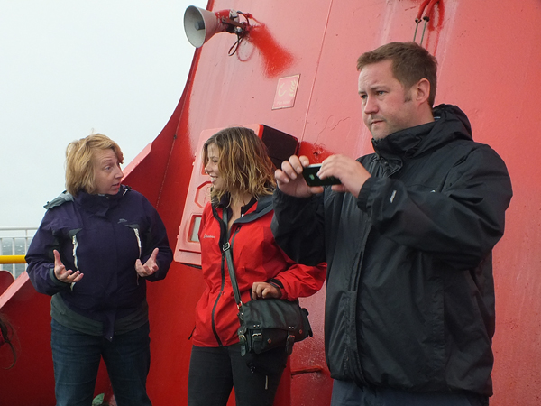 Sheltering behind the funnel on the way to Arran. DR Catherine McGavigan, Emma Downie and Gordon Mcdermid