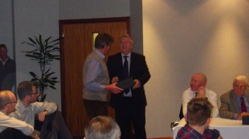 Our new chairman Bill Stafford presents Outgoing chairman Peter Kennedy with his gift