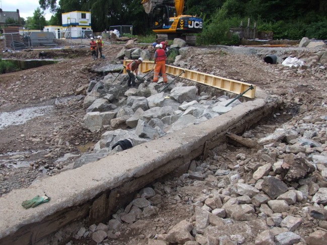 The foundation and shuttering at the lower edge of the weir. This will be reinforced before it is poured next week.